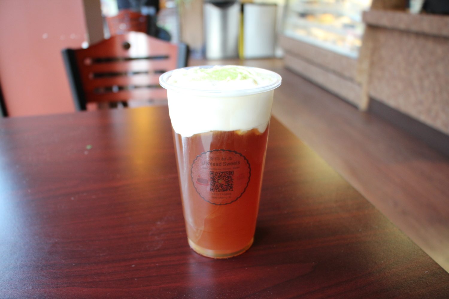 Cheese cream oolong tea, amber tea under a cap of salted cheese foam